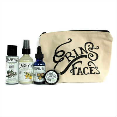 travel size cleanser, serum, oil and clay mask in a cream bag