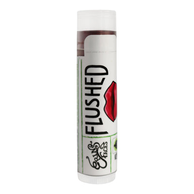 tinted lip balm color flushed in a closed tube